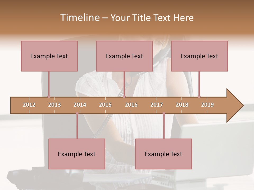 Businesswoman Sitting In Office With Laptop On Telephone PowerPoint Template