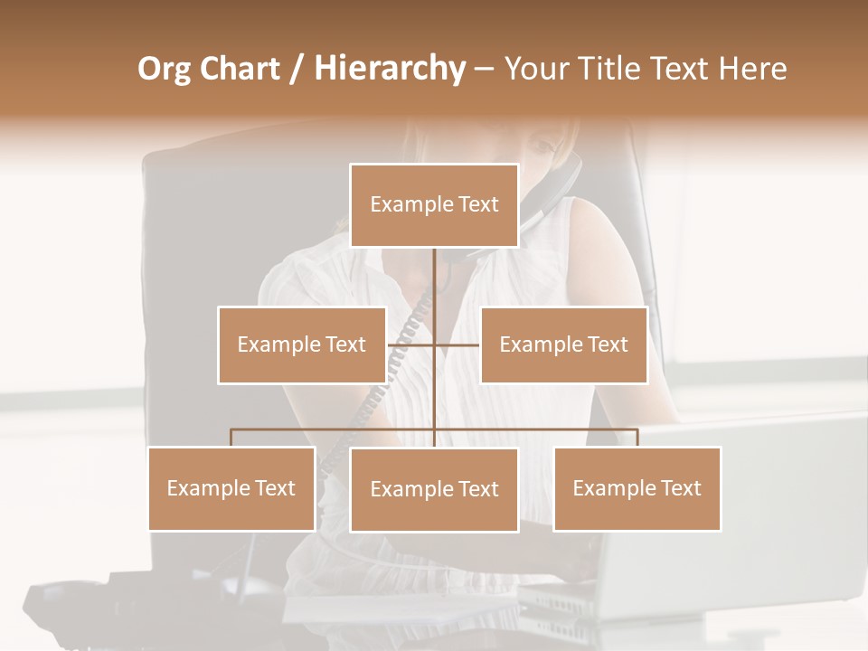 Businesswoman Sitting In Office With Laptop On Telephone PowerPoint Template