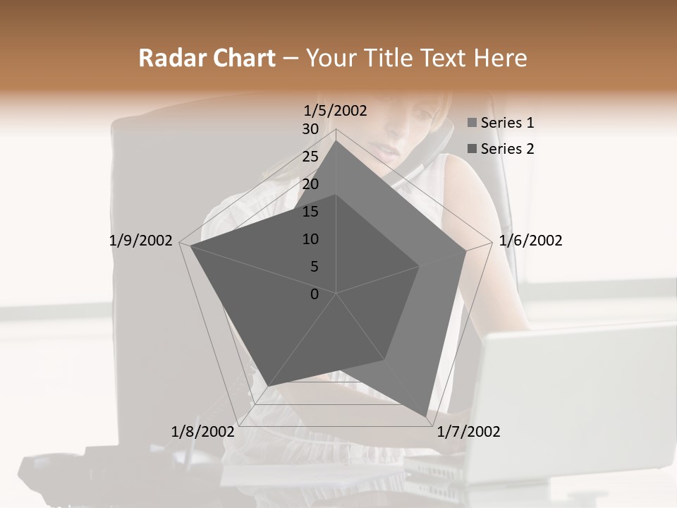 Businesswoman Sitting In Office With Laptop On Telephone PowerPoint Template