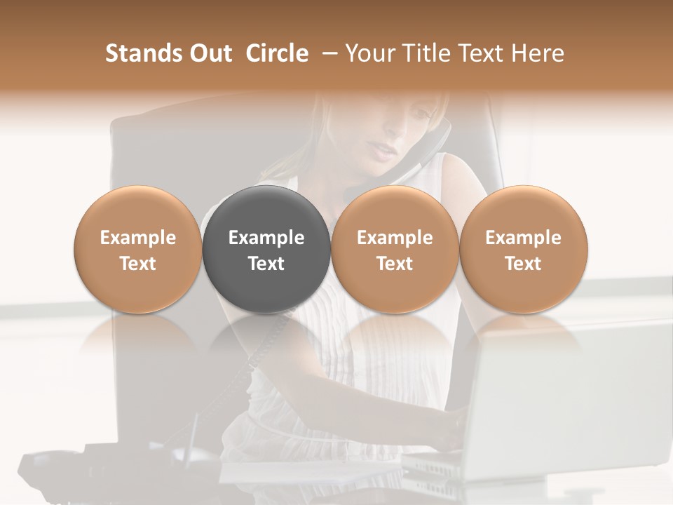 Businesswoman Sitting In Office With Laptop On Telephone PowerPoint Template