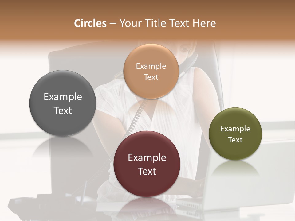 Businesswoman Sitting In Office With Laptop On Telephone PowerPoint Template