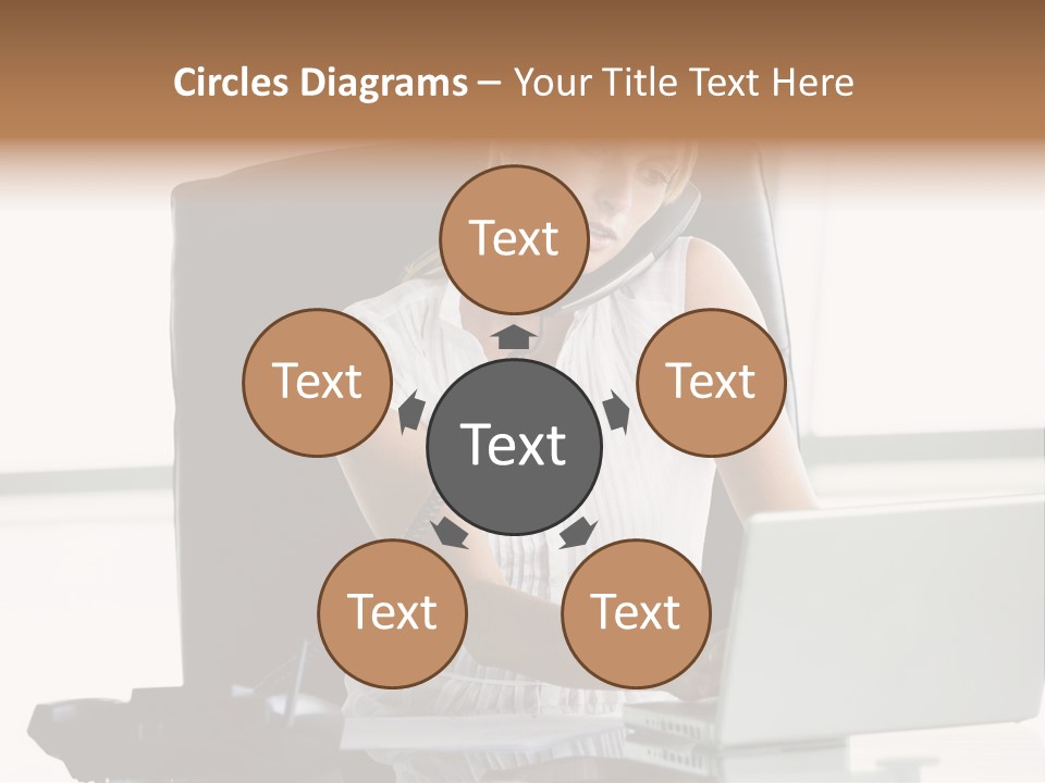 Businesswoman Sitting In Office With Laptop On Telephone PowerPoint Template