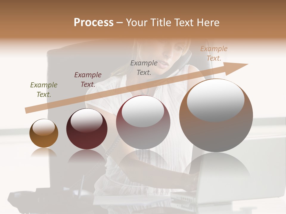 Businesswoman Sitting In Office With Laptop On Telephone PowerPoint Template