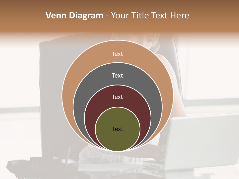 Businesswoman Sitting In Office With Laptop On Telephone PowerPoint Template