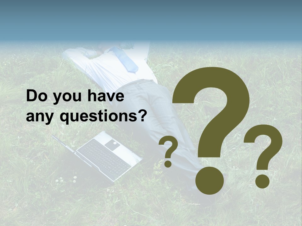 Image Of Businessman Relaxing On The Grass With Laptop Near By PowerPoint Template