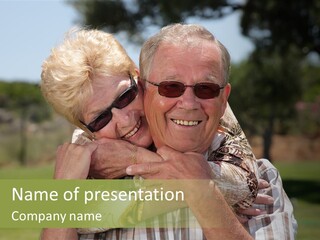 Happy Senior Couple Having Fun Outdoors PowerPoint Template