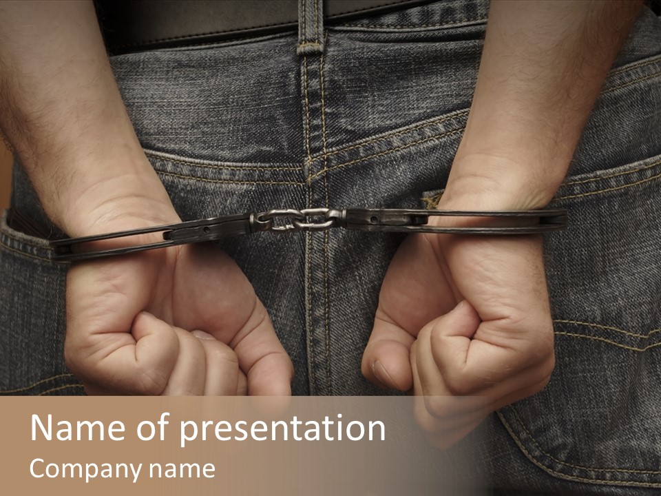 A Person Holding A Pair Of Scissors In Their Hands PowerPoint Template
