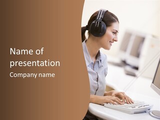 Woman Wearing Headphones In Computer Room Typing And Smiling PowerPoint Template