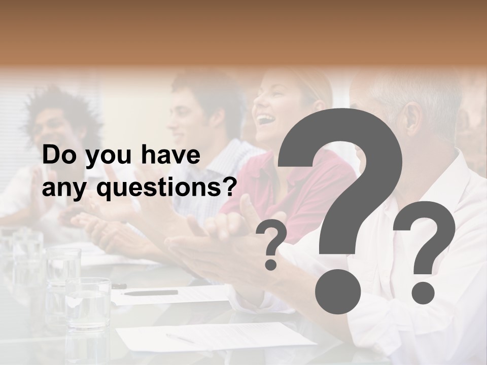 Four Businesspeople In Boardroom Applauding And Smiling PowerPoint Template