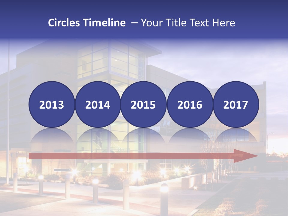 An Office Building With A Empty Parking Lot PowerPoint Template