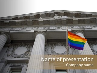 Lesbian, Gay, Bisexual, And Transgender Pride Flag Flying Outside A Government Building PowerPoint Template