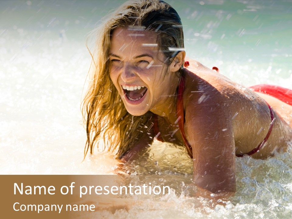 A Woman Is In The Water On A Surfboard PowerPoint Template