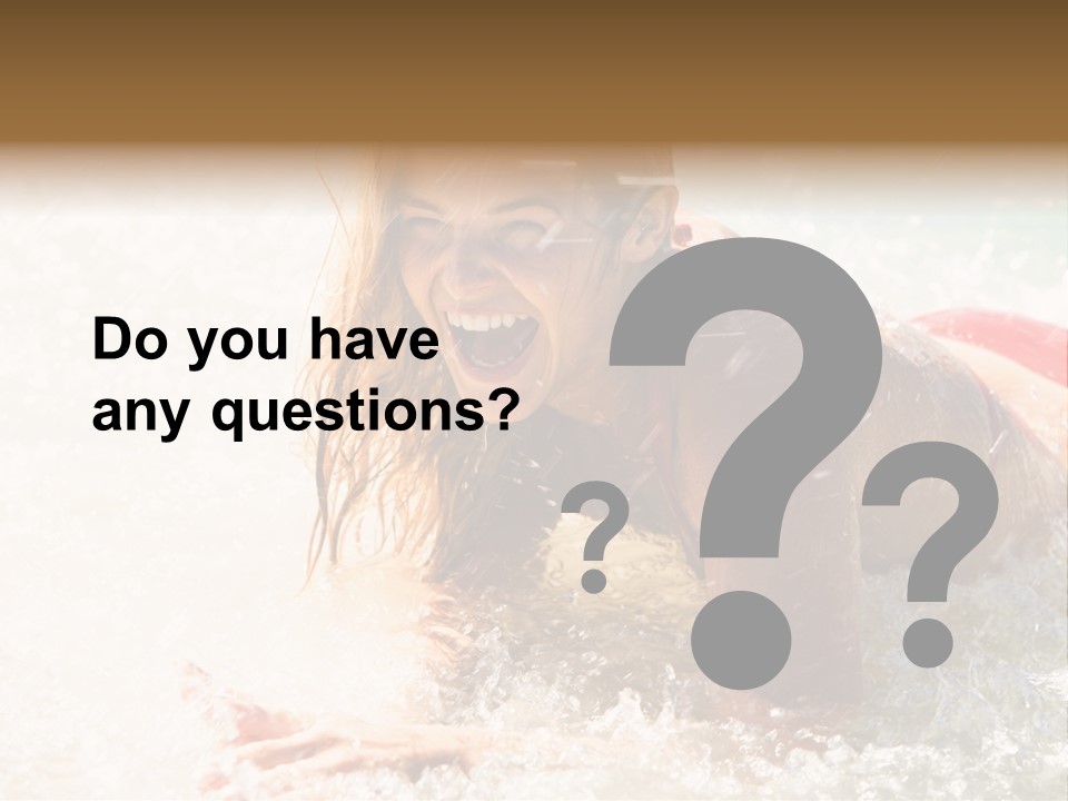 A Woman Is In The Water On A Surfboard PowerPoint Template