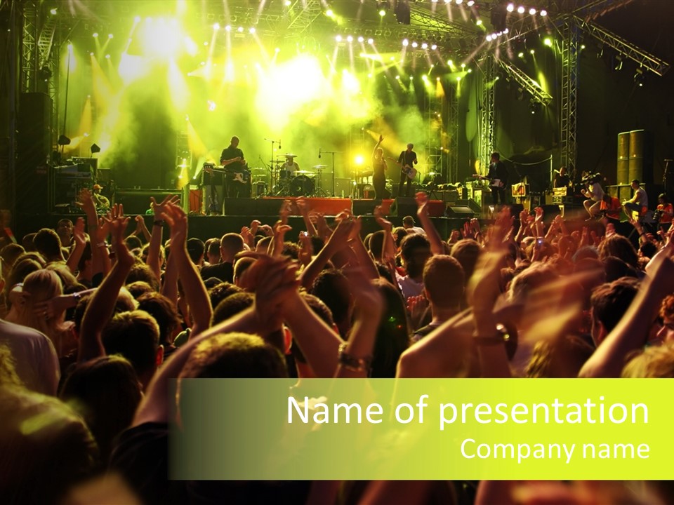 A Large Crowd Of People At A Concert PowerPoint Template