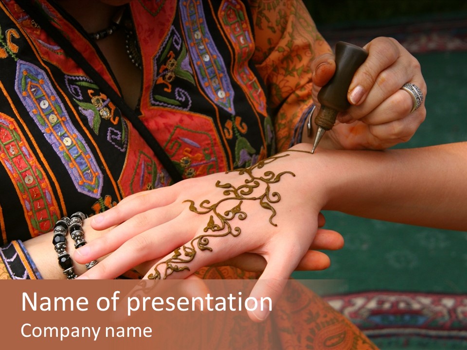 A Woman Paints A Design On A Girl With Henna. PowerPoint Template