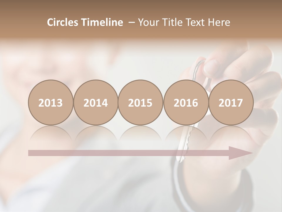 Photo Of Happy Woman├В??S Hand Holding New Key And Pointing It At Camera PowerPoint Template