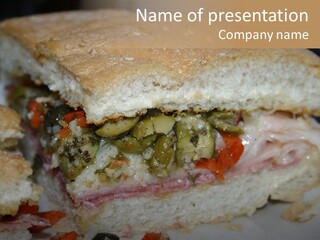 A Sandwich Is Cut In Half On A Plate PowerPoint Template