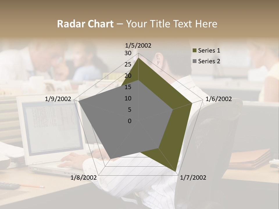 Businessman In Cubicle Using Laptop PowerPoint Template