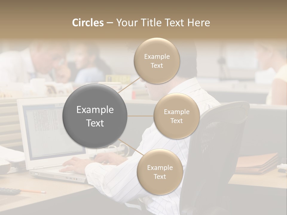 Businessman In Cubicle Using Laptop PowerPoint Template