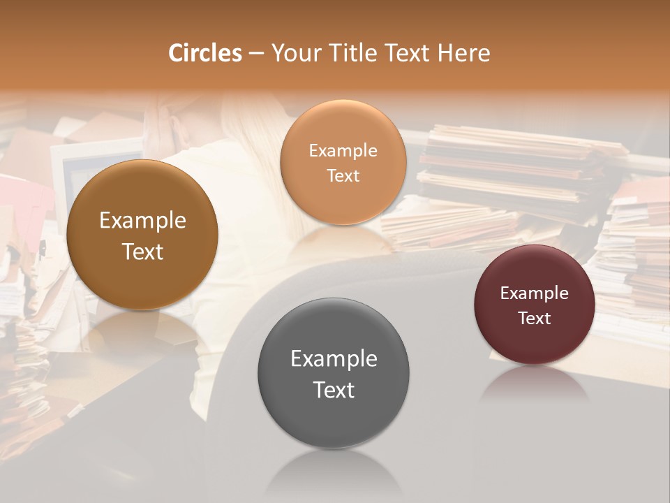 Businesswoman In Cubicle With Laptop And Stacks Of Files PowerPoint Template