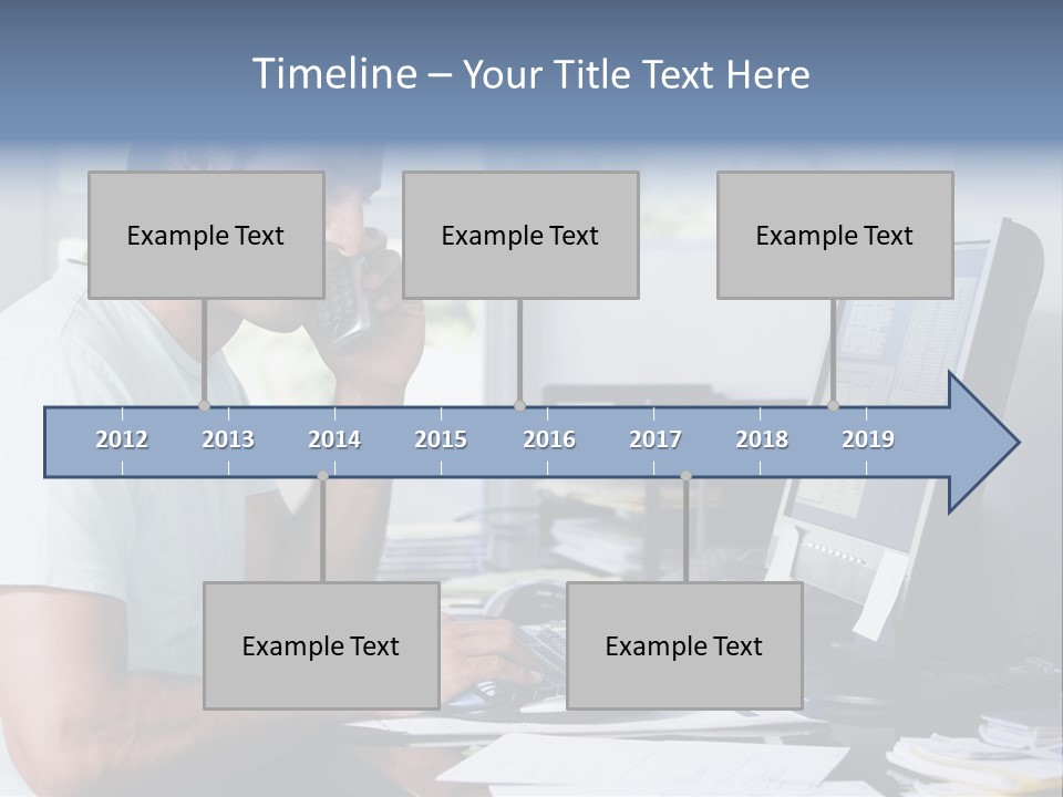 Man In Home Office On Telephone Using Computer And Smiling PowerPoint Template