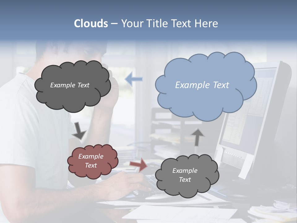 Man In Home Office On Telephone Using Computer And Smiling PowerPoint Template