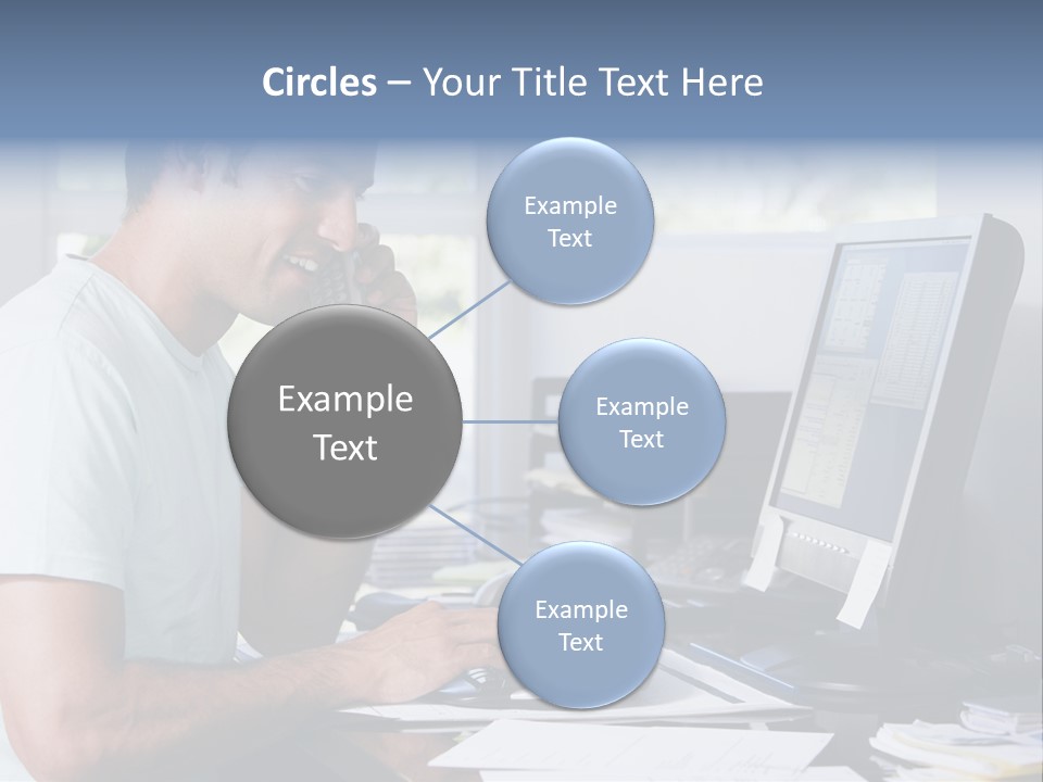 Man In Home Office On Telephone Using Computer And Smiling PowerPoint Template