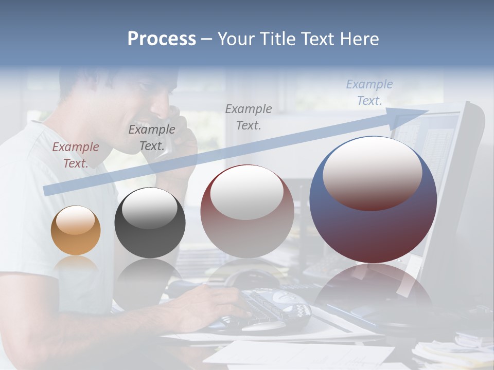 Man In Home Office On Telephone Using Computer And Smiling PowerPoint Template
