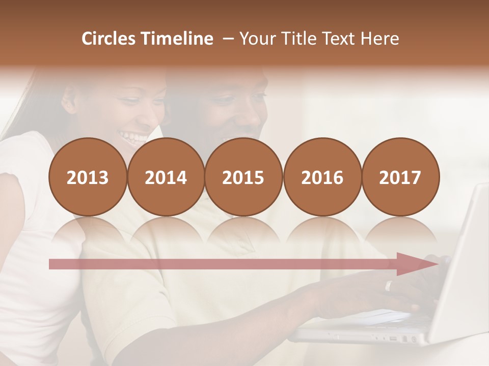 Couple In Living Room Using Laptop And Smiling PowerPoint Template