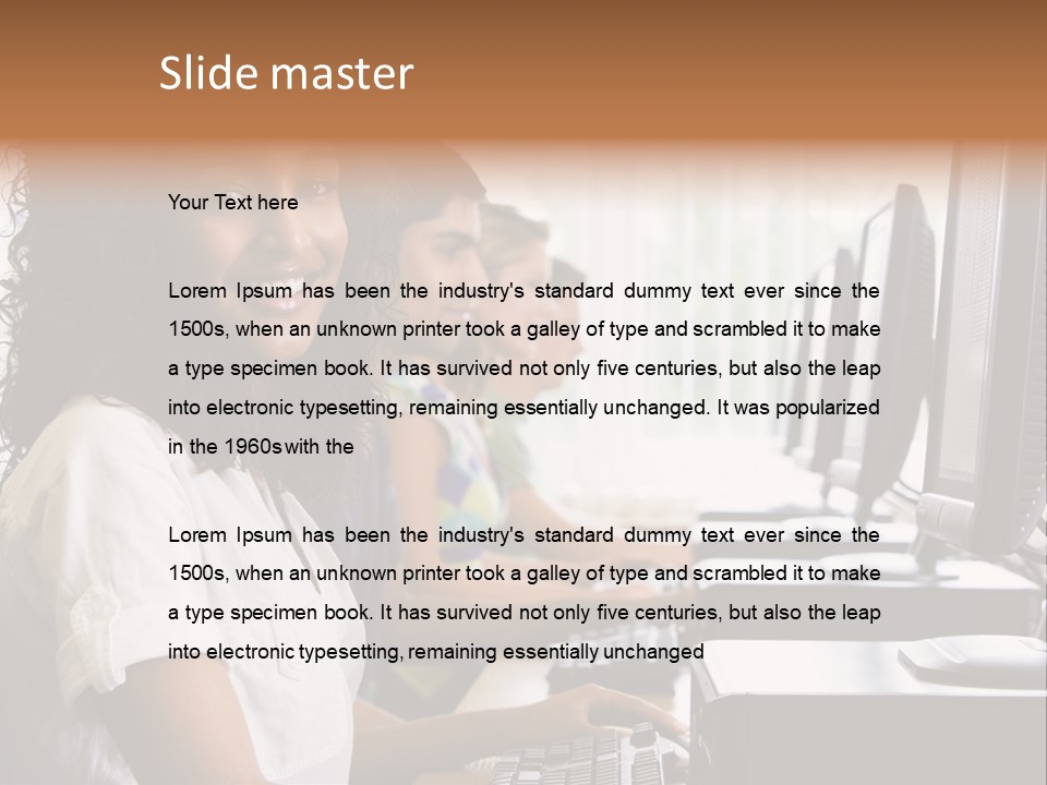 A Group Of People Sitting In Front Of Computers PowerPoint Template