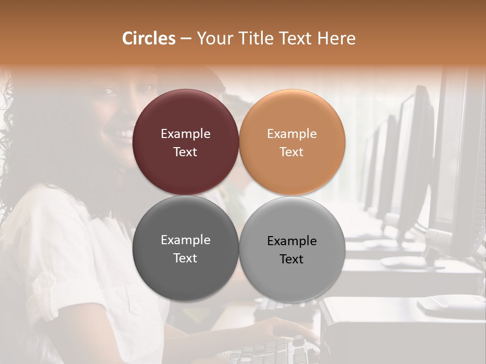 A Group Of People Sitting In Front Of Computers PowerPoint Template