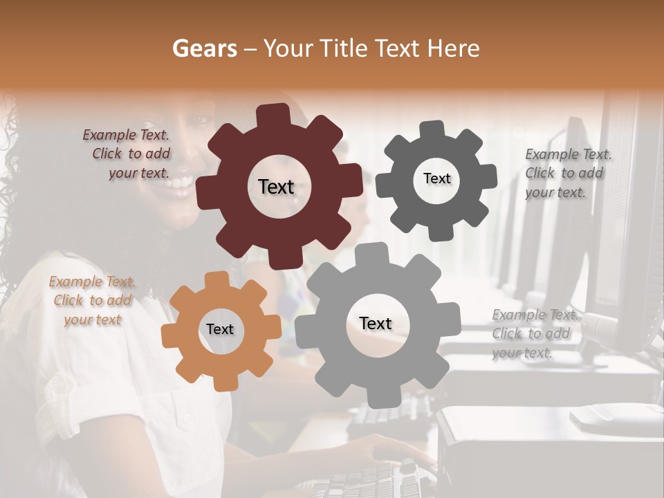 A Group Of People Sitting In Front Of Computers PowerPoint Template