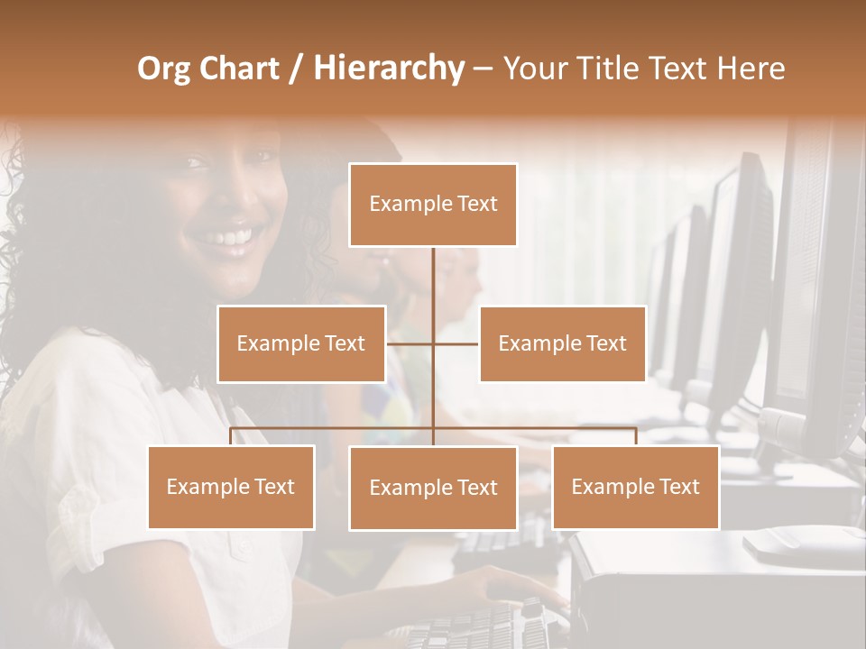A Group Of People Sitting In Front Of Computers PowerPoint Template