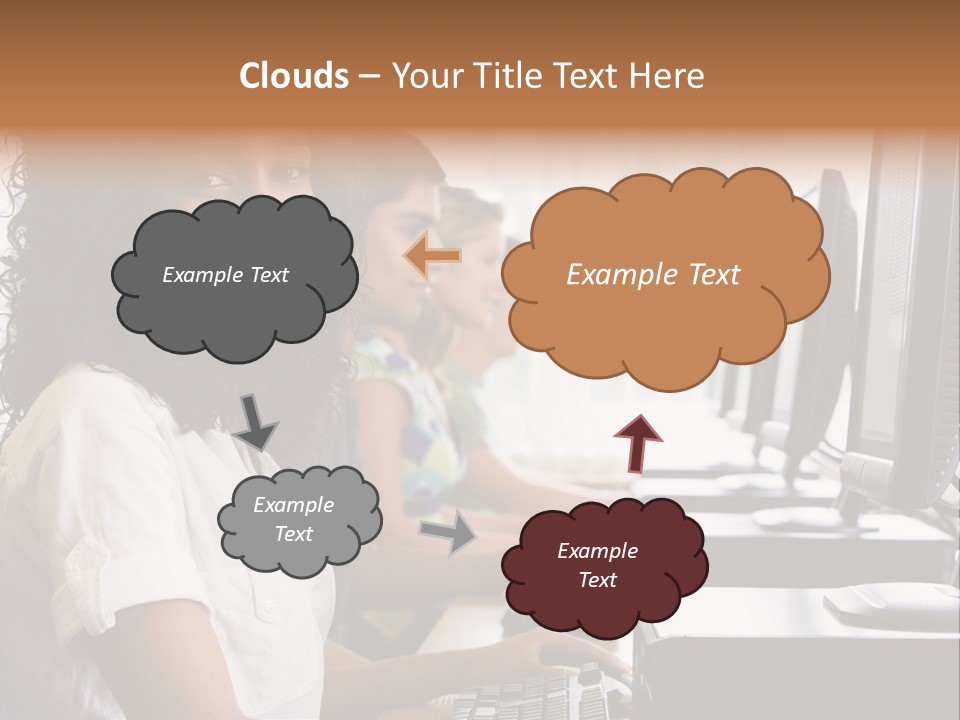 A Group Of People Sitting In Front Of Computers PowerPoint Template