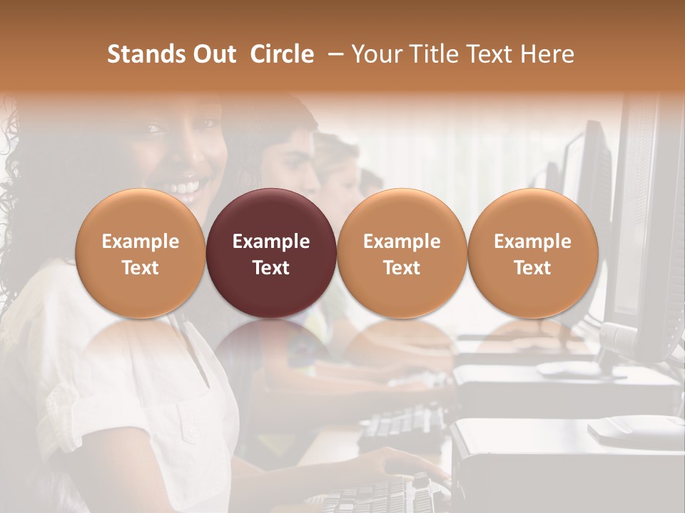 A Group Of People Sitting In Front Of Computers PowerPoint Template