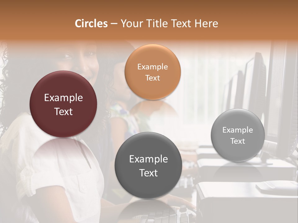 A Group Of People Sitting In Front Of Computers PowerPoint Template