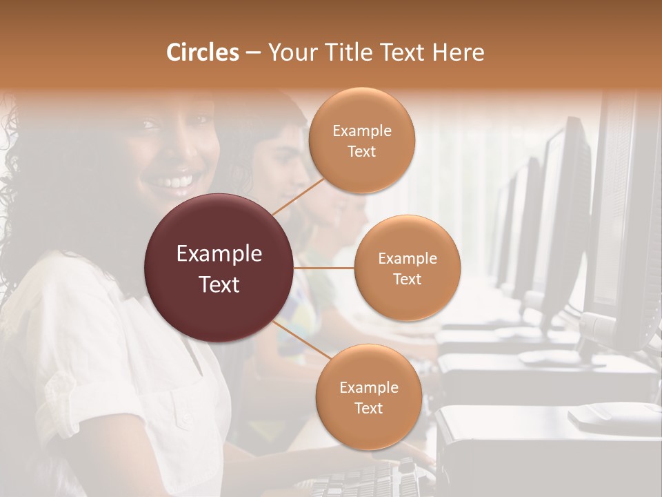 A Group Of People Sitting In Front Of Computers PowerPoint Template