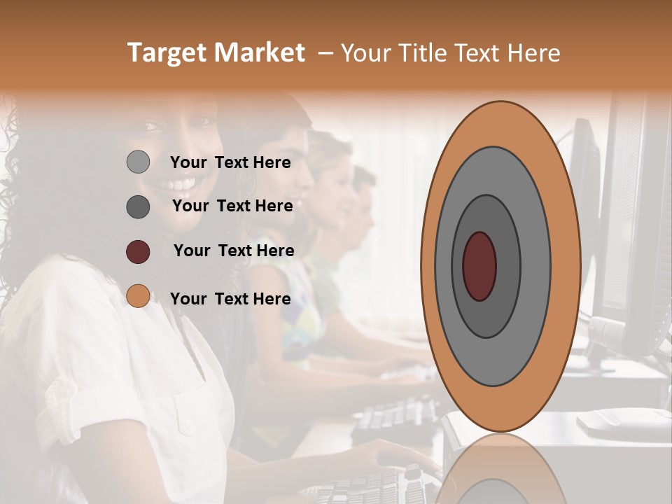 A Group Of People Sitting In Front Of Computers PowerPoint Template