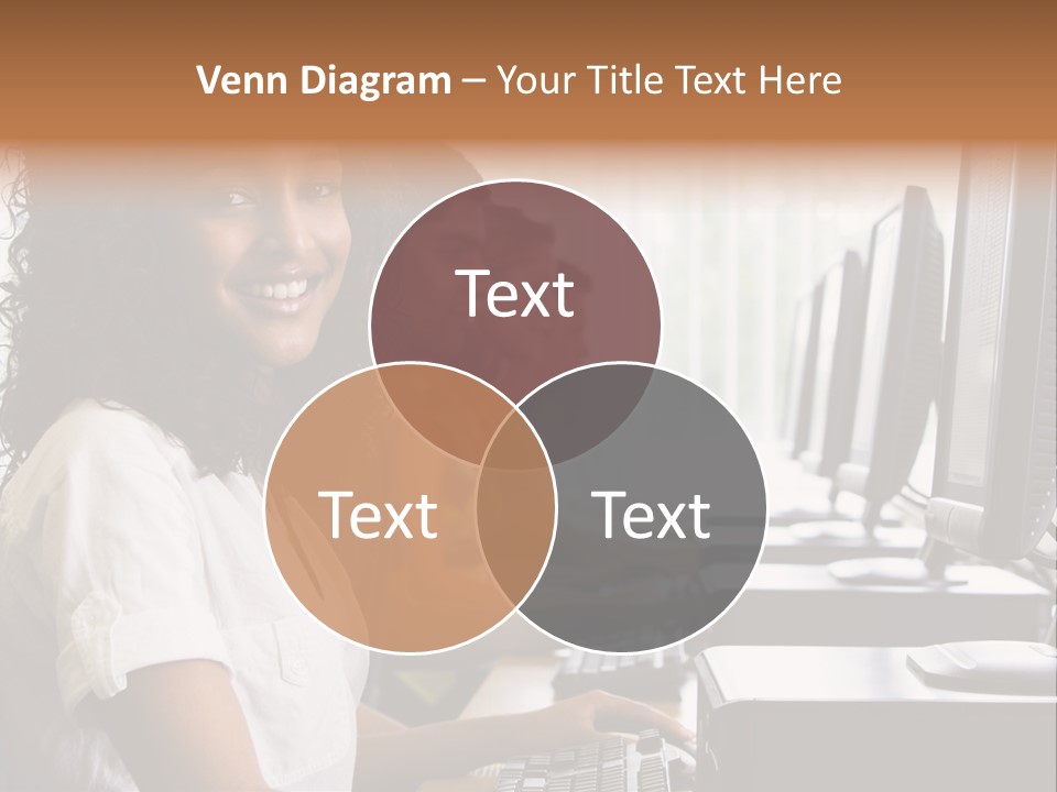 A Group Of People Sitting In Front Of Computers PowerPoint Template