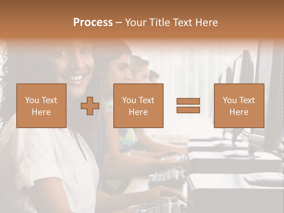A Group Of People Sitting In Front Of Computers PowerPoint Template