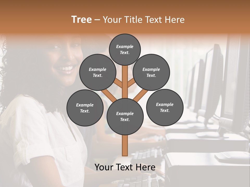 A Group Of People Sitting In Front Of Computers PowerPoint Template