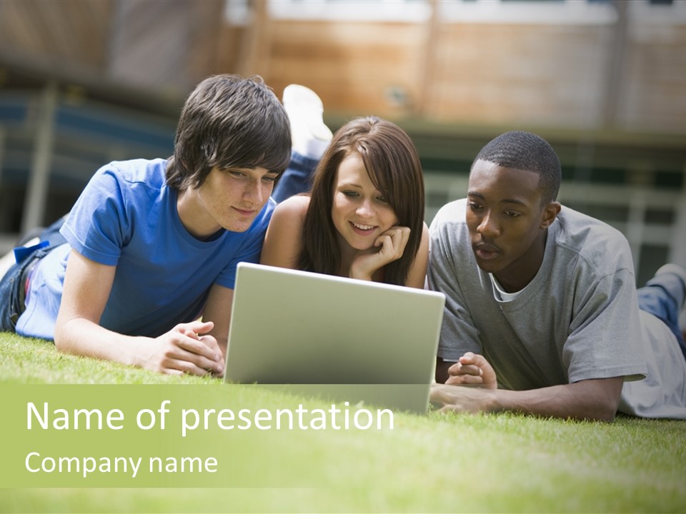 College Students Using Laptop On Campus Lawn, PowerPoint Template