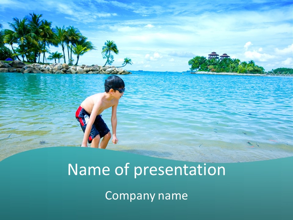 Young Boy Enjoying The Blue Waters Of The Tropical Lagoon PowerPoint Template