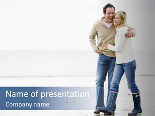 Couple Walking On Beach Arm In Arm Smiling PowerPoint Template