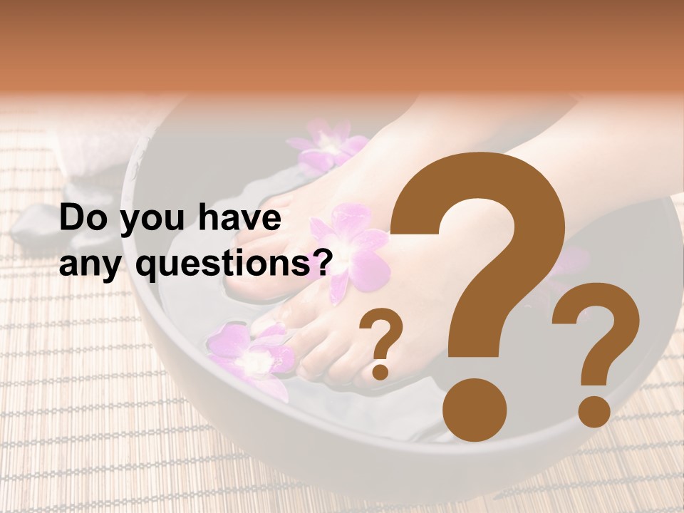Woman Soaking Feet In Bowl Of Floral Scented Water In Spa PowerPoint Template