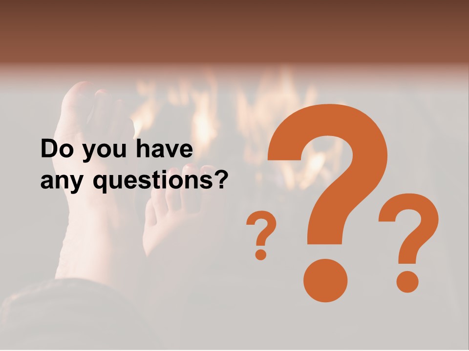 Feet Warming At A Fireplace PowerPoint Template