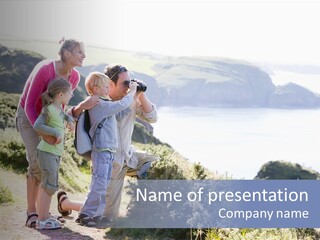 Family On Cliffside Path Using Binoculars And Smiling PowerPoint Template