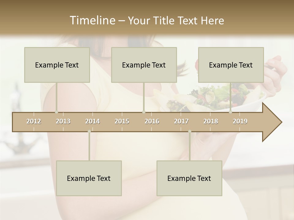 Pregnant Woman In Kitchen Eating A Salad Smiling PowerPoint Template