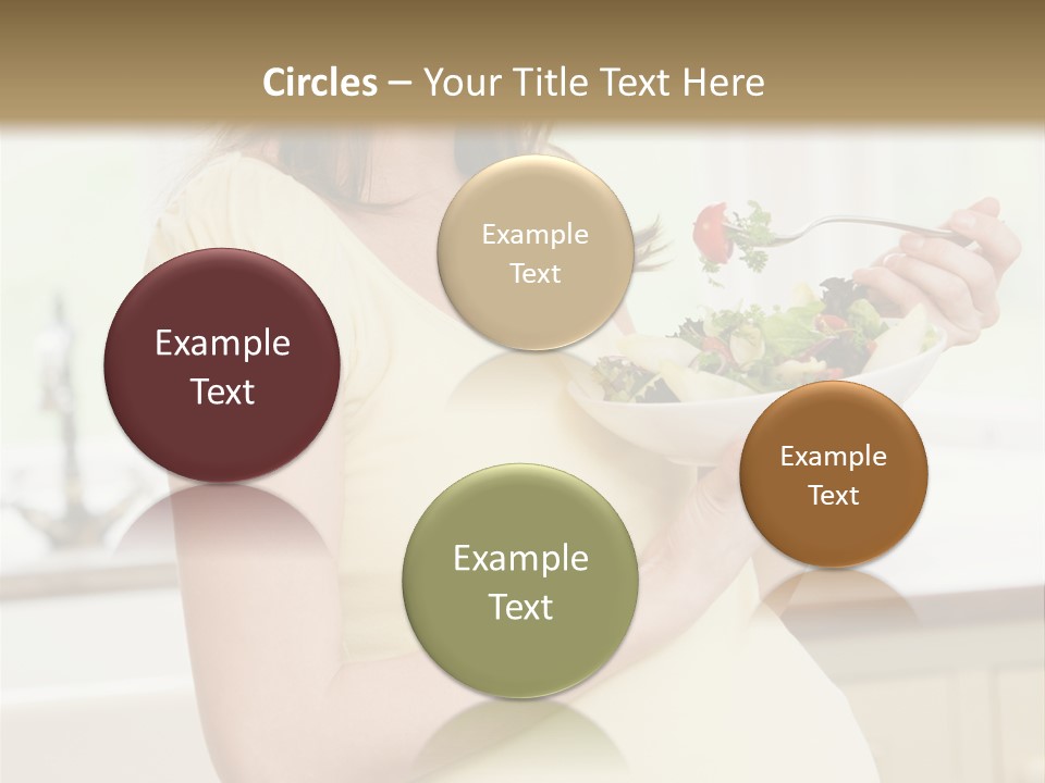 Pregnant Woman In Kitchen Eating A Salad Smiling PowerPoint Template