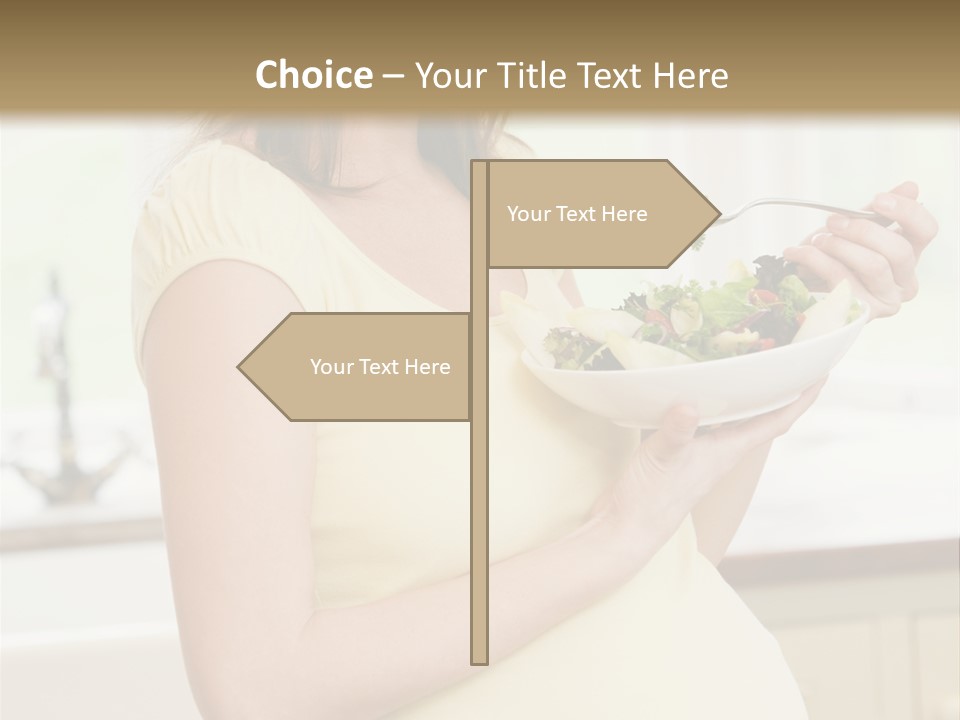 Pregnant Woman In Kitchen Eating A Salad Smiling PowerPoint Template